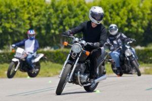 A student learning to ride during a MSF Basic Rider Course.  Photo credit: MSF