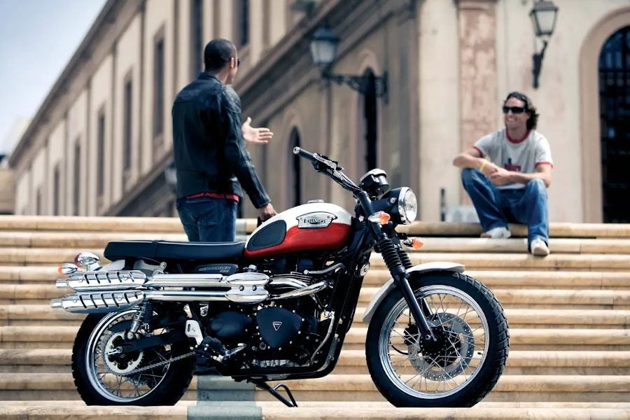 An original marketing image for the first-gen Triumph Scrambler. Hipster culture wasn't quite as mainstream then, and the marketing wasn't as focused on equating bohemians and bikes, but it definitely was marketed at youthful riders, not boomers (even if it was boomers who bought these bkes). Photo: Triumph